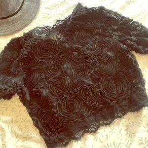 Sheer black crop top.